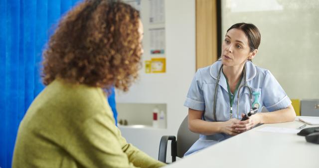 Nurse talking to a patient